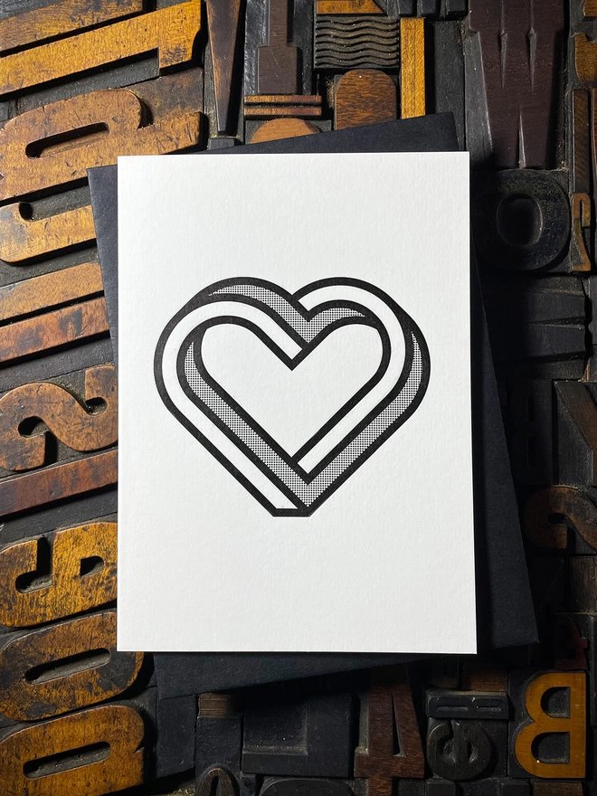 MONO INFINITY HEART LETTERPRESS CARD. Printed on my 1915 Arab Crown Folio Press. Black ink using a deep impression print. Printed on the finest Colorplan Pristine White thick double-sided card with a range of matching colours self-seal envelope.