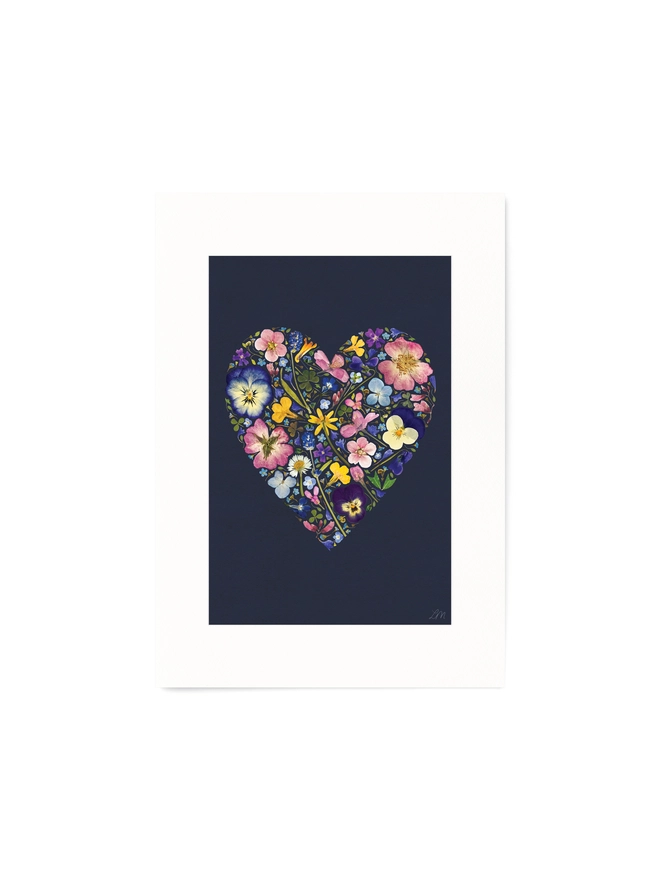 A4  Floral Print of Pressed Flowers arranged in a heart shape, on a Ink background.