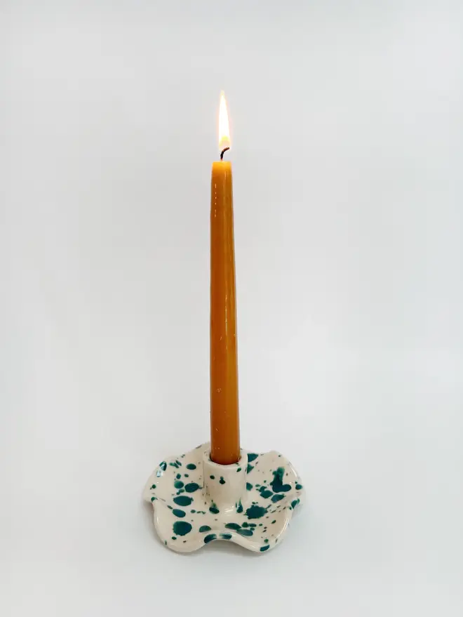 green ceramic wavy candlestick holder