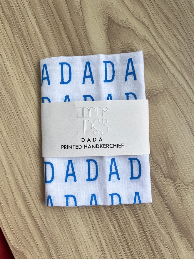 DADA handkerchief folded on a table