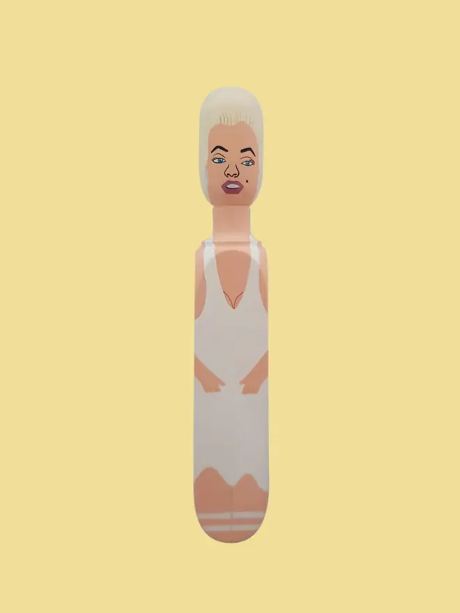 Wooden Door Stopper (Maz), a colourful wooden door stop sitting on a white surface. 