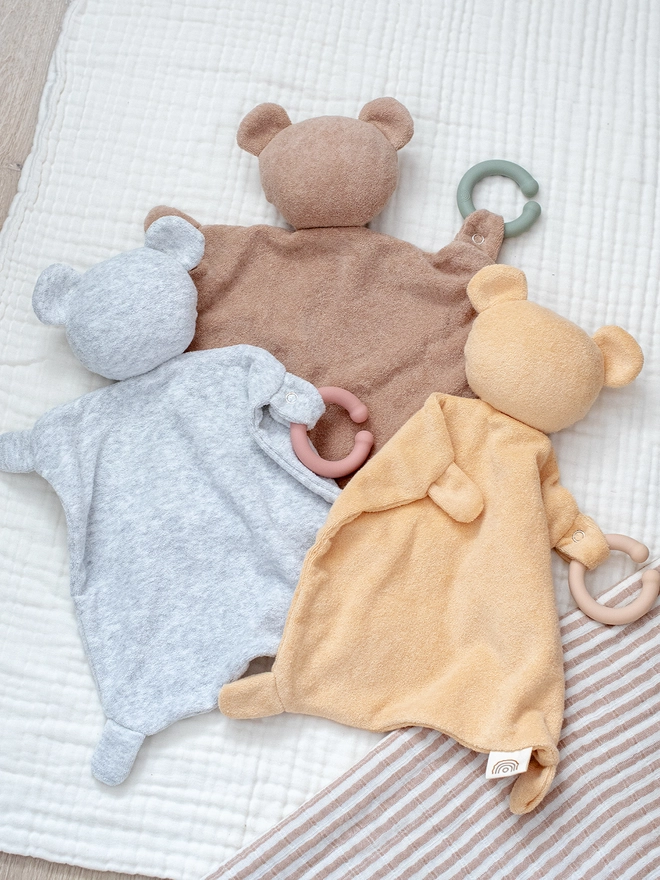 Teddy lovey toys made from terry cloth material.