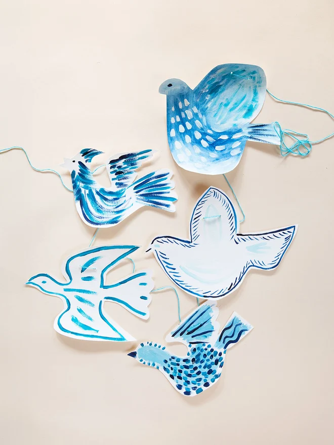 Dove garland inspired by artist Picasso's doves painted art project