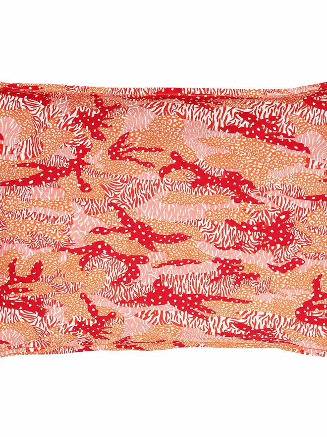 Orange Big Cat Camo Duvet Cover And Pillowcase, a red pillow sitting on a white surface. 