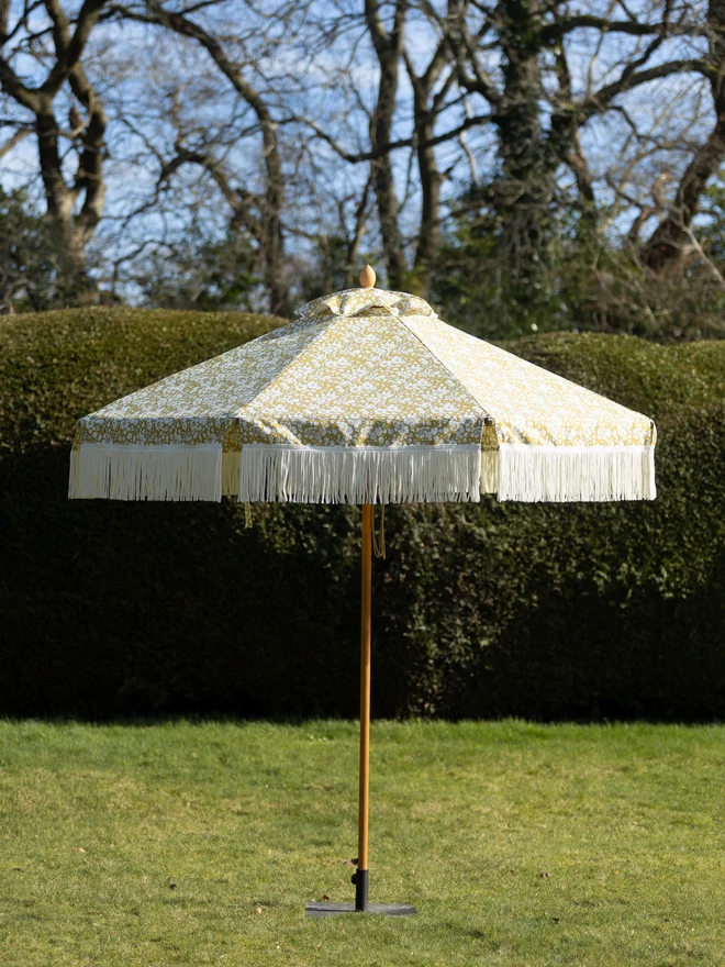 Liberty London Fringed Parasol. A parasol in fennel yellow.