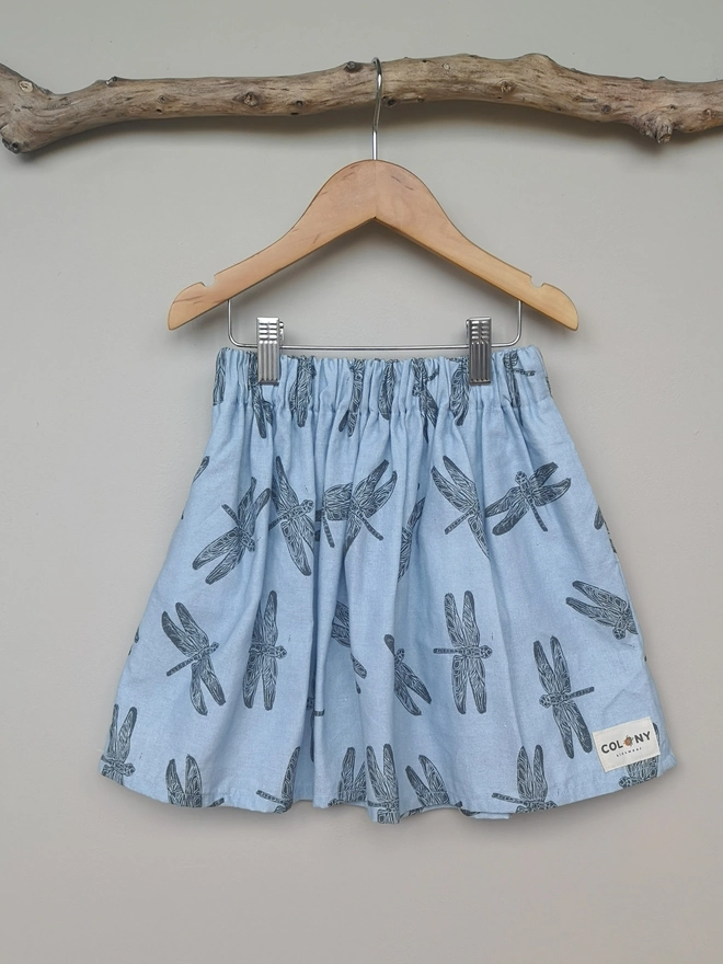 Girls Cotton Linen Blue Skirt. Grey Dragonfly Print with Elasticated Waist and Side Seam Pockets.