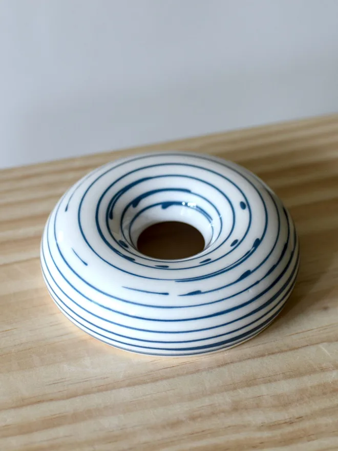 Avocado Planter White & Blue Handmade porcelain avocado planter with carved blue pattern, designed to hold an avocado seed for sprouting