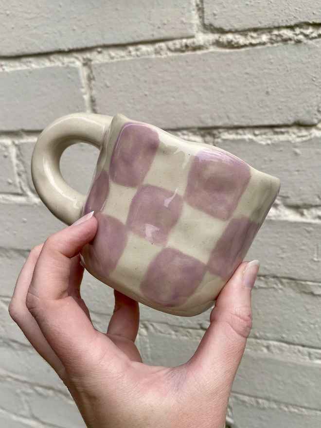 purple checkerboard mug