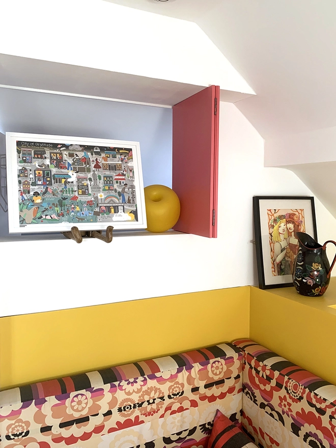 The illustrated map on gratitude shown framed in a room setting