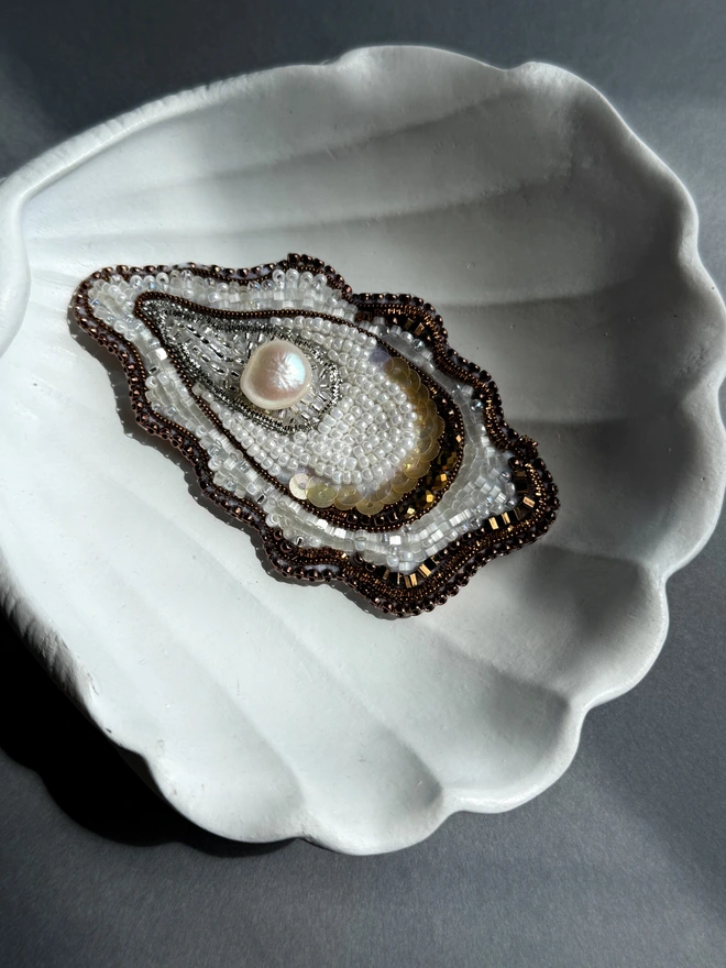 oyster brooch