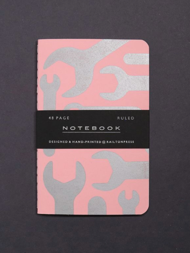 Lined Spanner Pocket Notebook. A notebook in pastel pink
