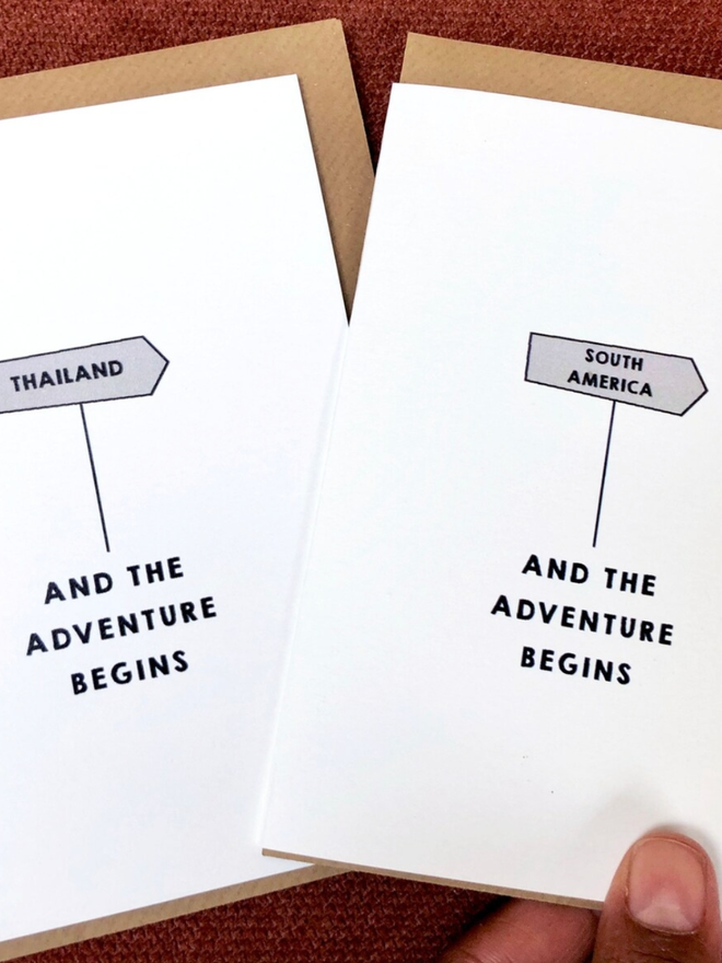 The Adventure Begins Card. Two cards showing location personalisation options for the card’s design.
