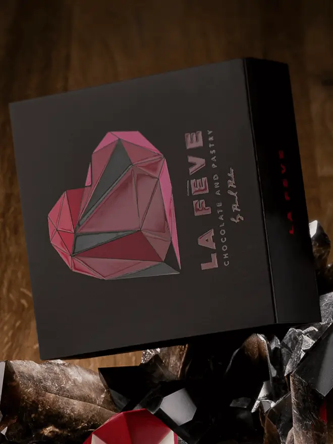 La Feve red heart chocolate eco-lux black box close up - heart graphic with embossed logo