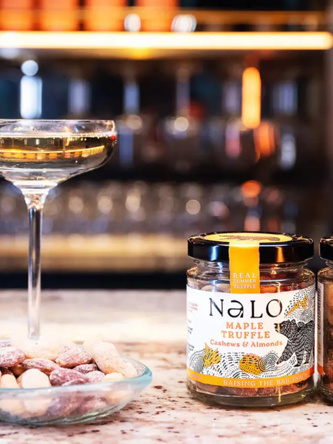 Maple Truffle Cashews & Almonds (Set Of 6), displayed next to a martini. 