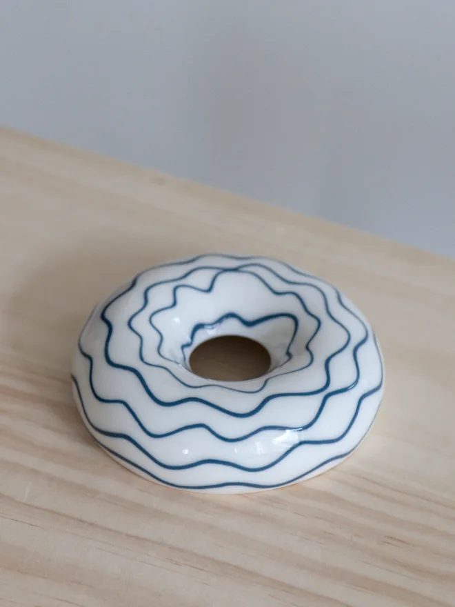 Avocado Planter White & Blue Handmade porcelain avocado planter with carved blue pattern, designed to hold an avocado seed for sprouting