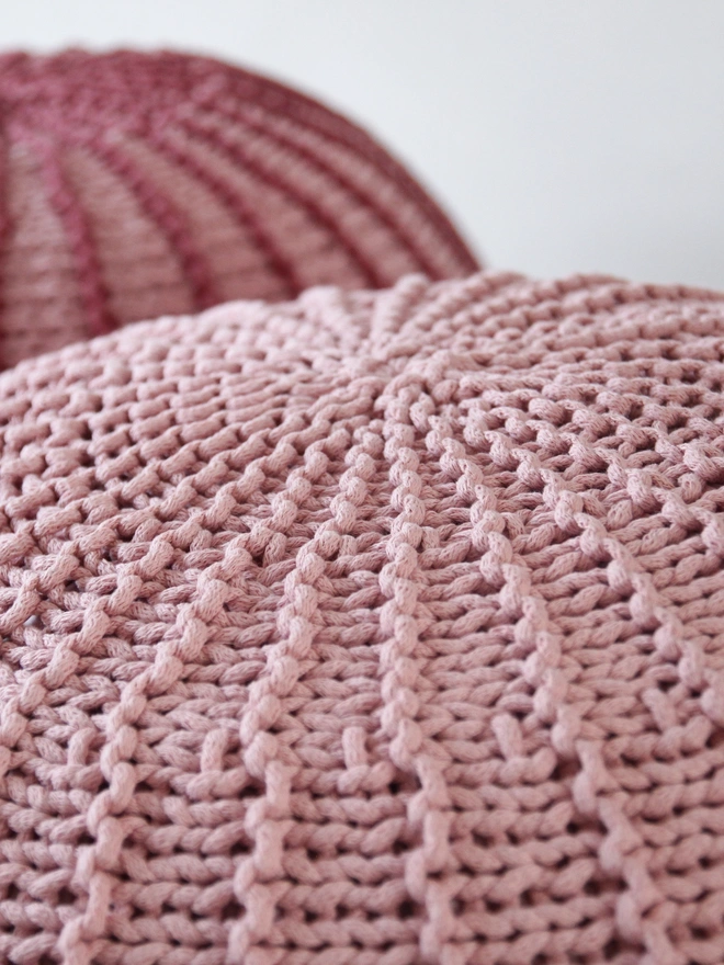 powder pink knitted pouffe