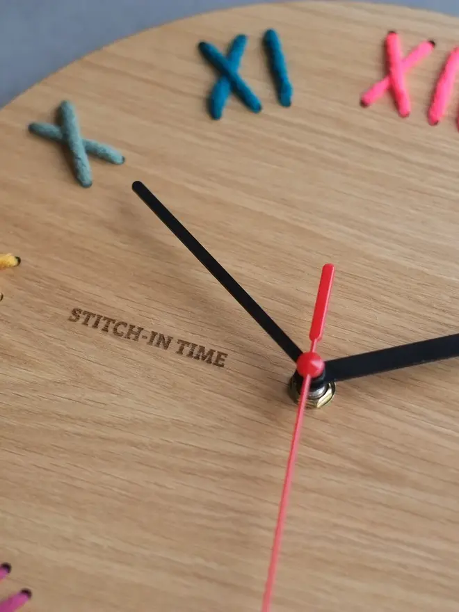 oak clock kit with multi coloured stitched letters