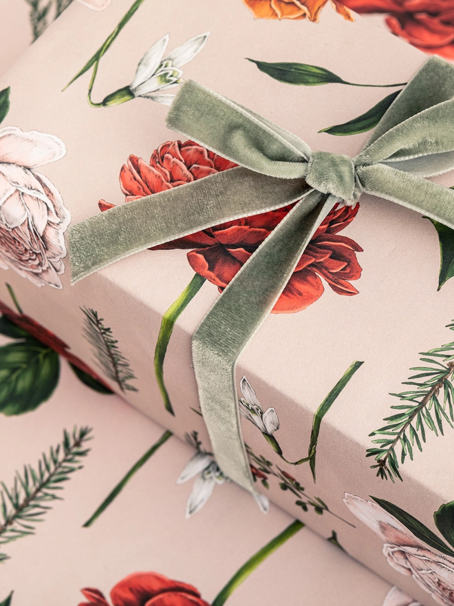 pink base christmas wrap with red and pink roses