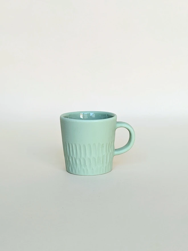 Tiny Porcelain Espresso Cup Pale Rockpool Green Hand Carved Scalloped Texture