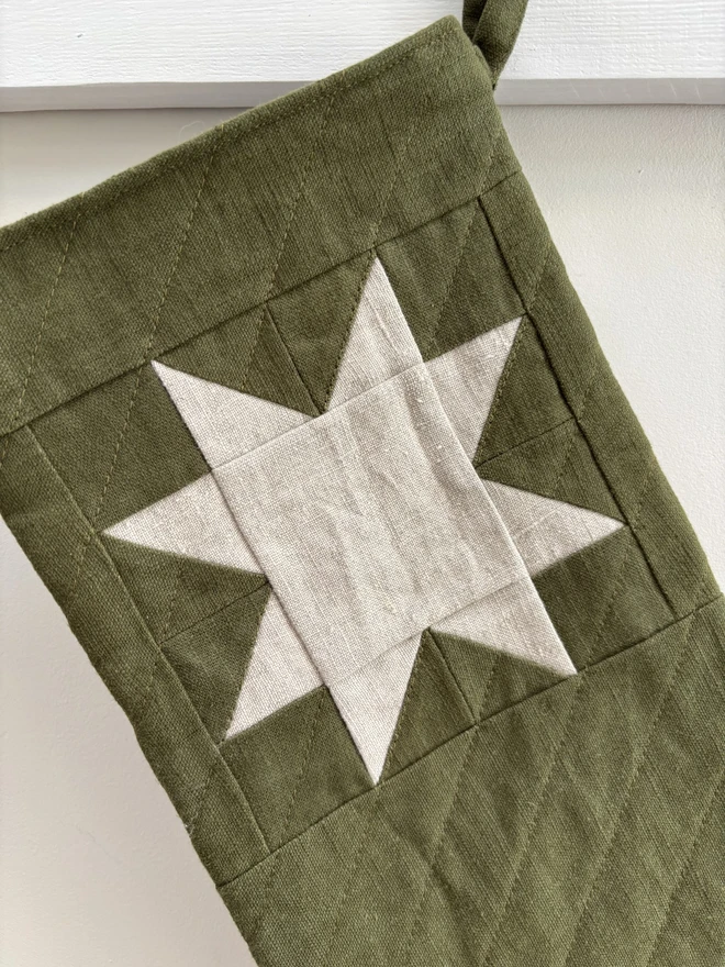 Natural Linen Star Detail on Green Linen Quilted Christmas Stocking.