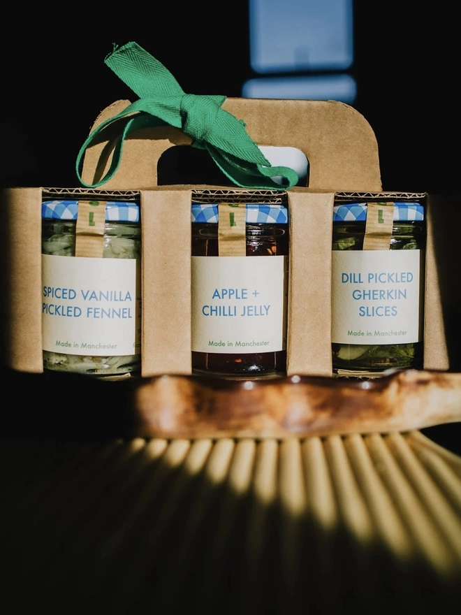 Jar Gift Set (Pack Of 3), pack of 3 jars packaged together with a green bow. 