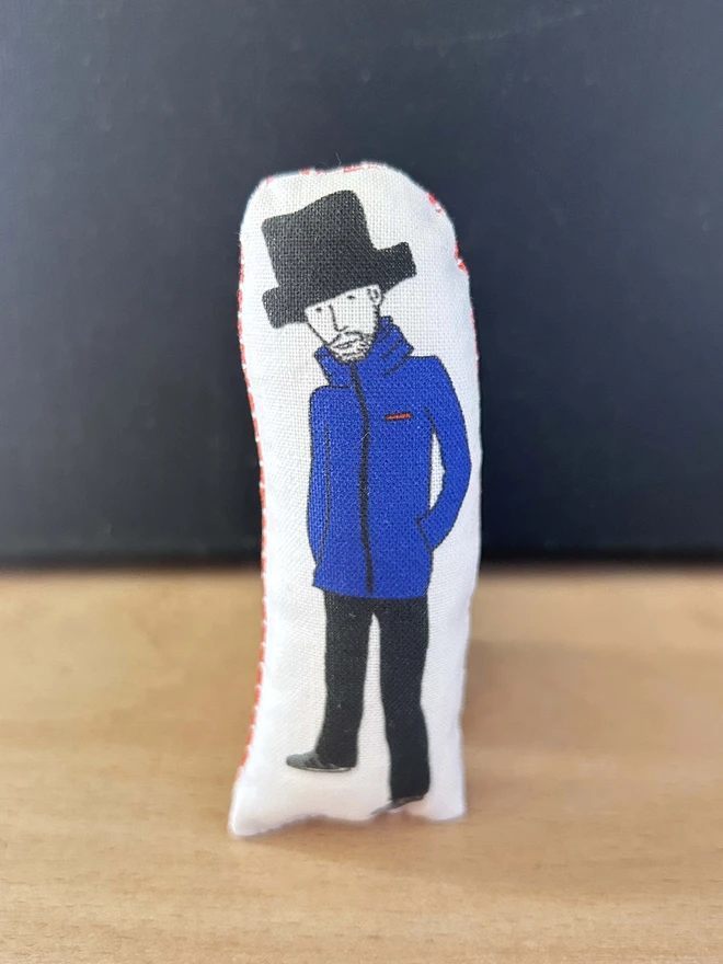 Mini fabric doll featuring illustration of Jamiroquai frontman, Jay Kay.