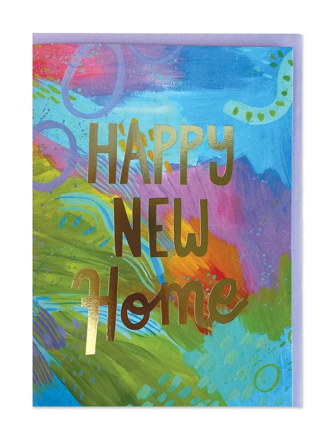 A painterly new home card with abstract design in vibrant brush strokes in all colours of the rainbow. Finished with a gold foil ‘Happy New Home’ message