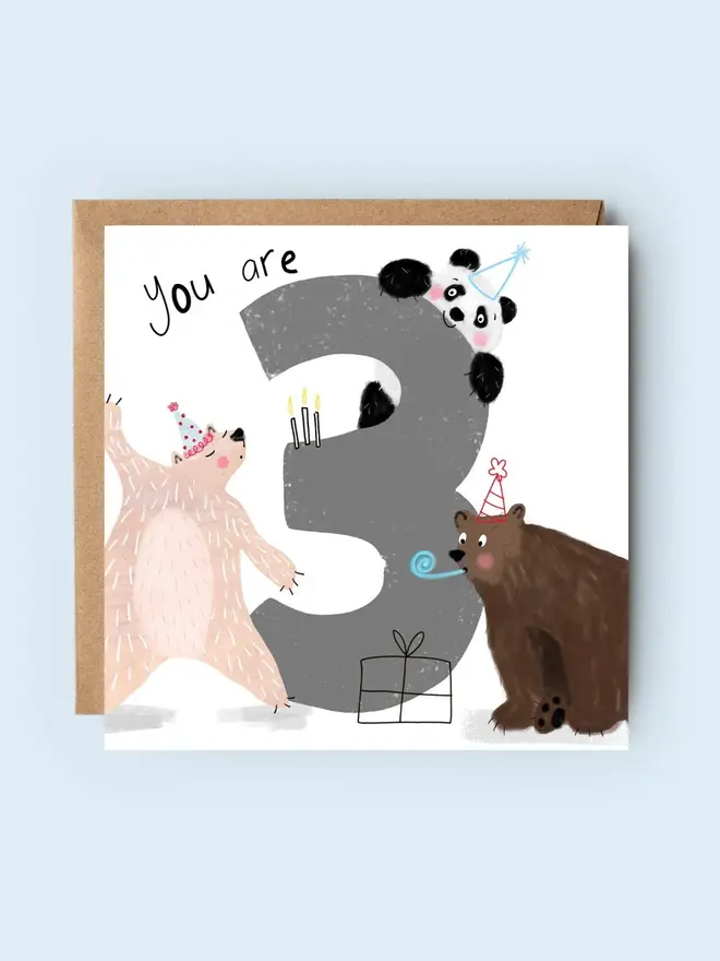 'you are 3' illustrated birthday card. card featuring a big grey number 3 and illustrated bears.