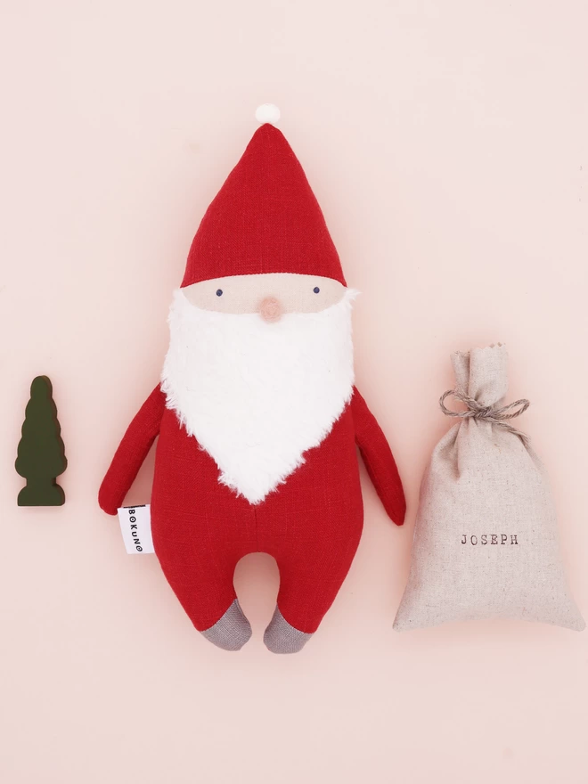 father christmas doll with red outfit and personalised sack 