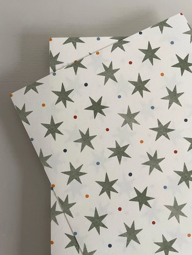 Ducks In A Row Stars and Spots Kids Wallpaper in Puddle Green colour way A4 Samples close up