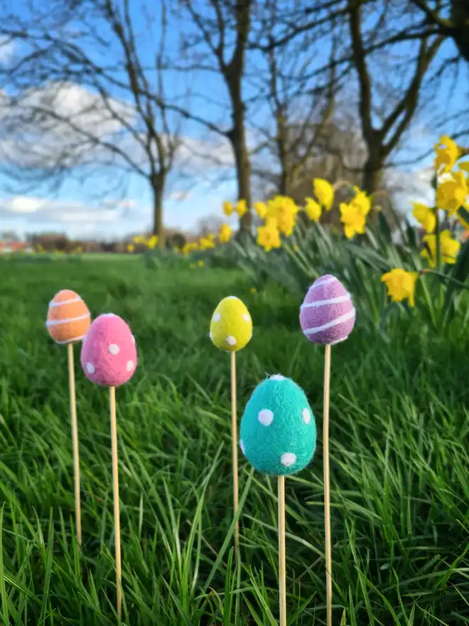 felt Easter eggs on bamboo sticks