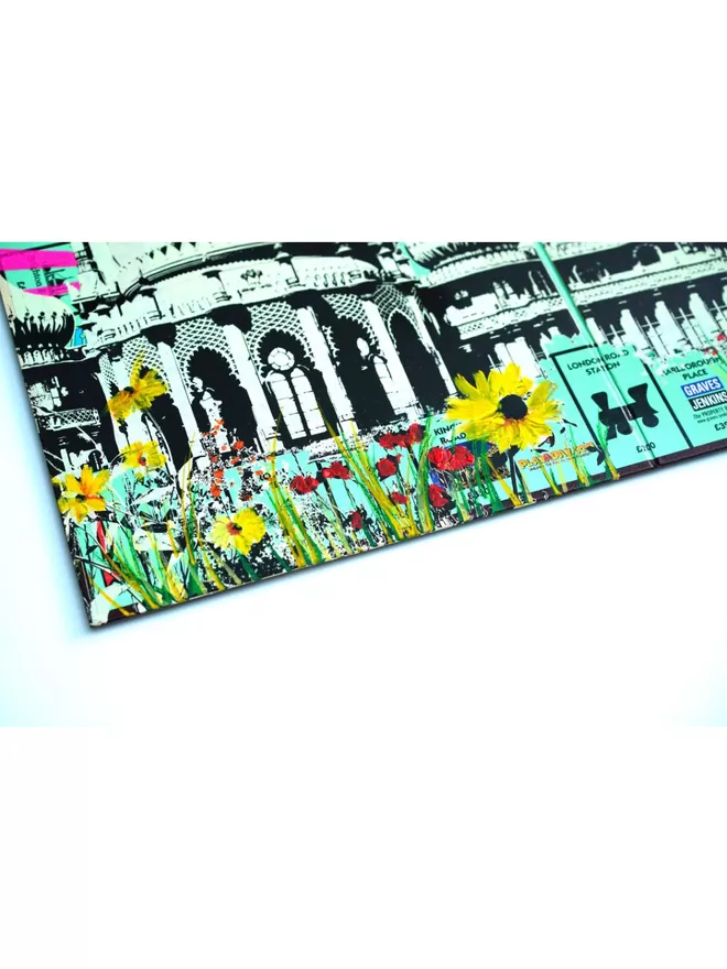 Monopoly Board corner edge with colourful flowers printed on top 