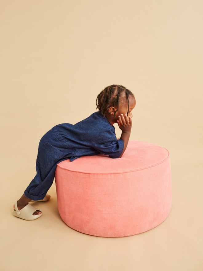 cool kid wearing oversized japanese style denim boilersuit, made in the UK by small brand studio koter also stocked in ando stores