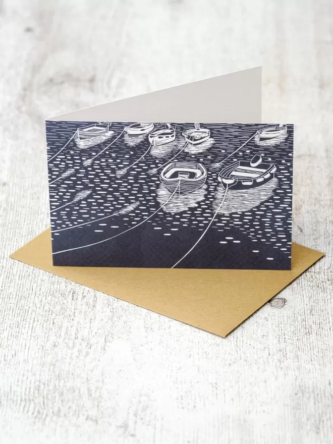 Greeting Card with an image of Rowing Boats in St Mawes, taken from an original lino print