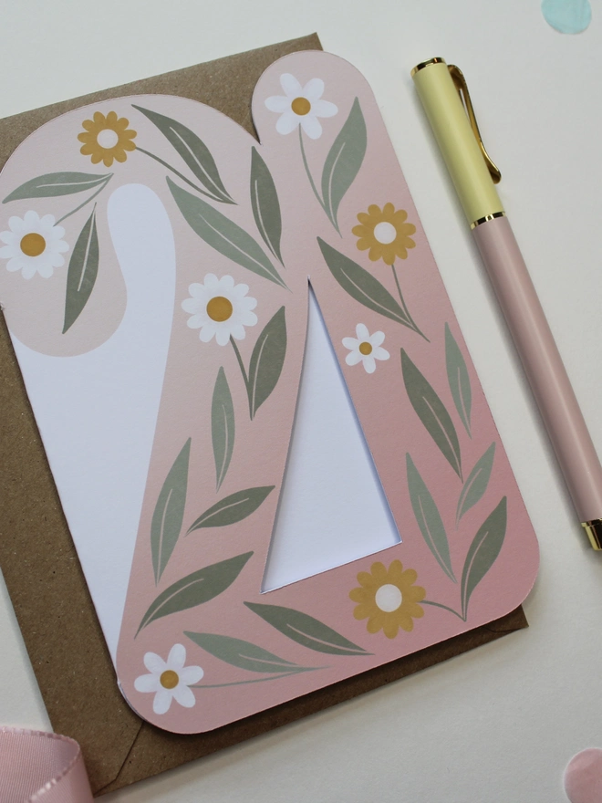 floral 21st birthday card. card shaped like number 21 with illustrated flowers and leaves.