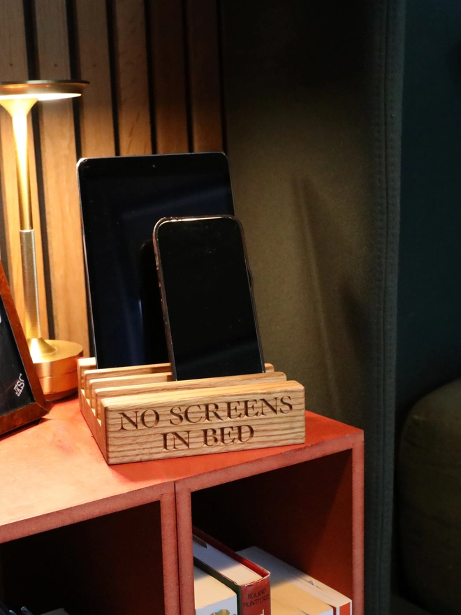 Phones on bedside table