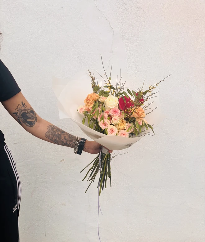 Garden inspired Mothers Day bouquet, girl holding. Designed and created by Peony Belles 