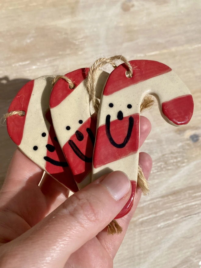 ceramic candy cane hanging decoration - group - close up