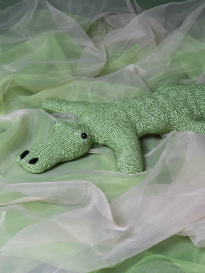 Crocodile Knitting Kit. A knitted crocodile.
