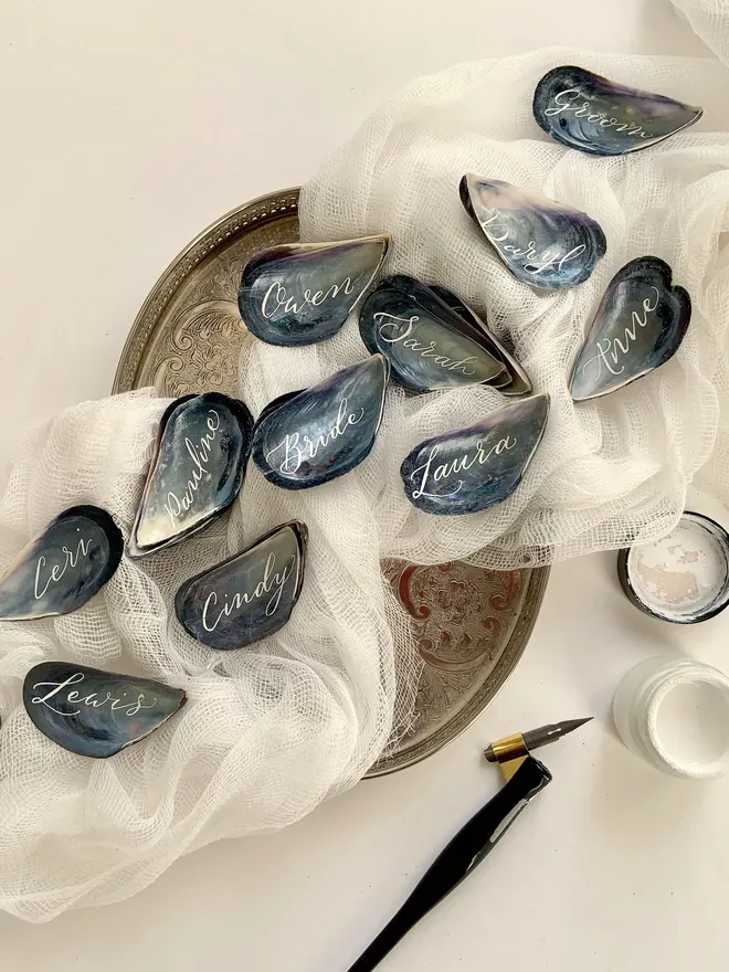 mussel shell place names displayed on a tray