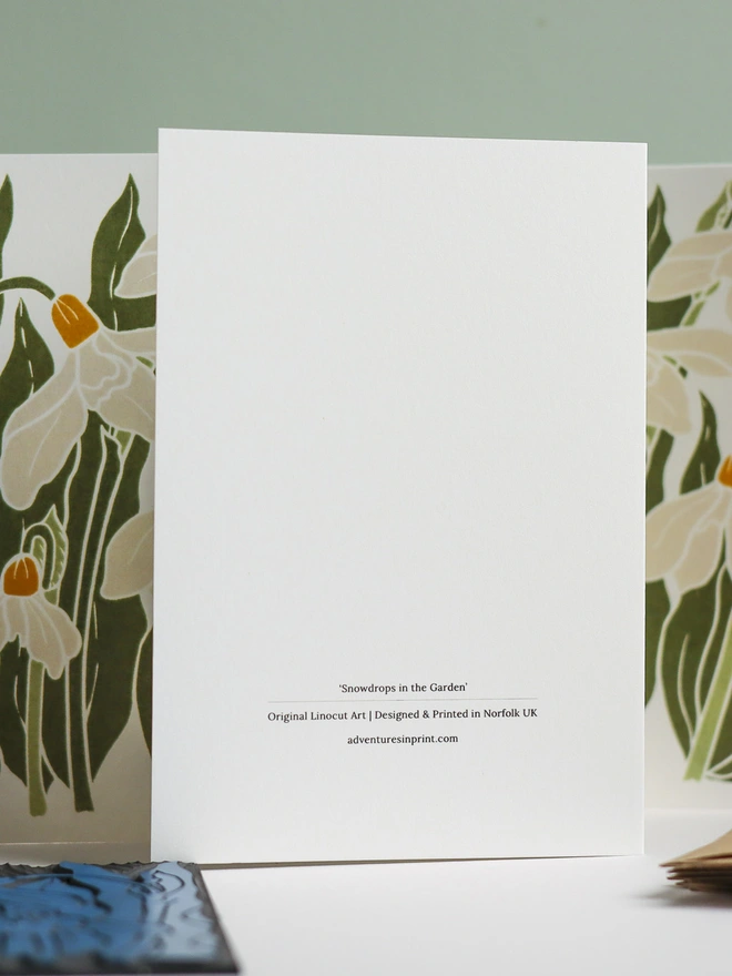 Reverse of linocut snowdrop notecards, blank inside and small batch printed in the UK on recycled card