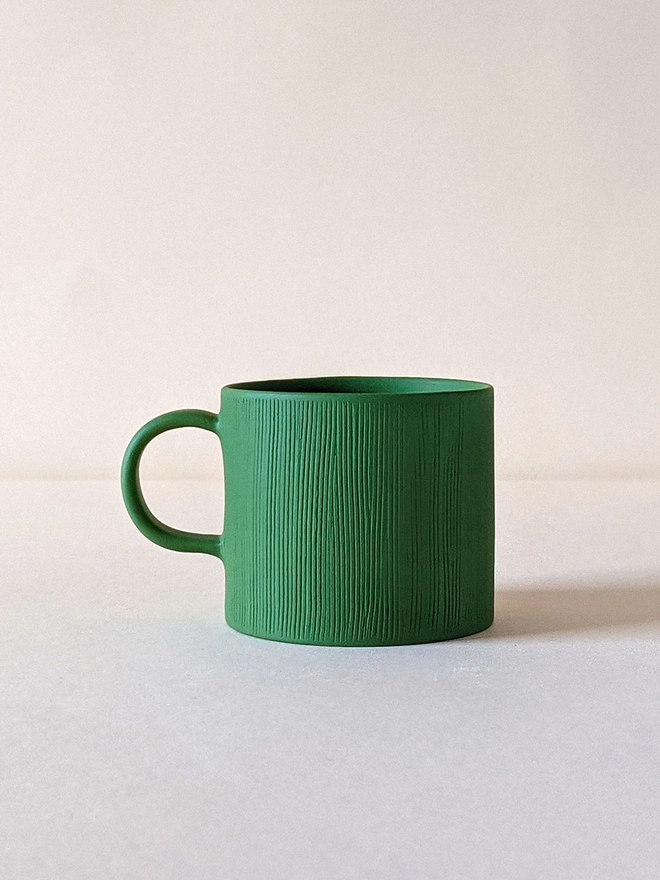 Small Porcelain Coffee Cup in Dark Angelica Green with Hand Carved Combed Texture