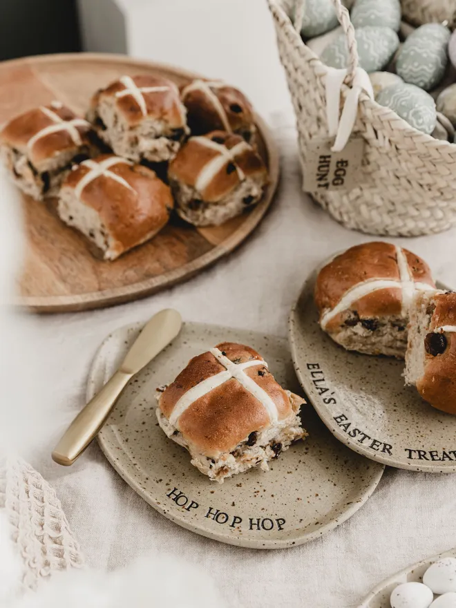 Egg shaped speckled plate with hot cross buns