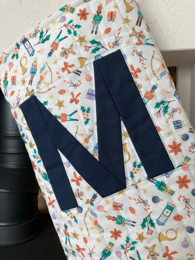 Cooper and Fred Ditsy Nutcracker Personalised Christmas Stocking with Navy M Letter