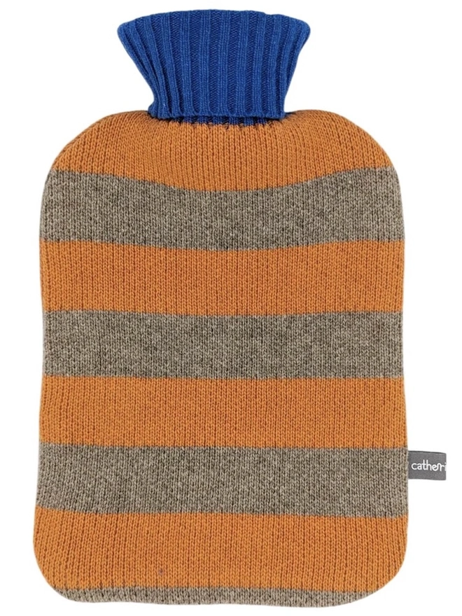 Lambswool Hot Water Bottle Cover, a colourful hot water bottle cover sitting on a plain white surface. 