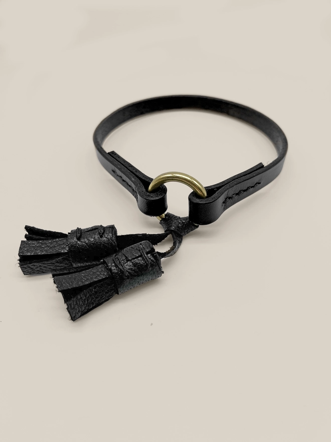 black leather house collar with moccasin tassels