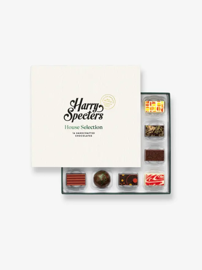 A box of 16 premium chocolates partially covered with a Harry Specters lid
