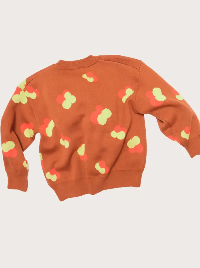 Back flat lay of the Studio Koter Finneas cardigan showing the all-over jacquard floral motif.