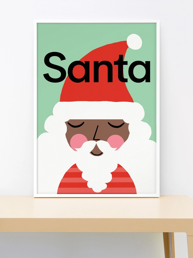 Framed wall print of an illustrated Santa Claus on a mint green background