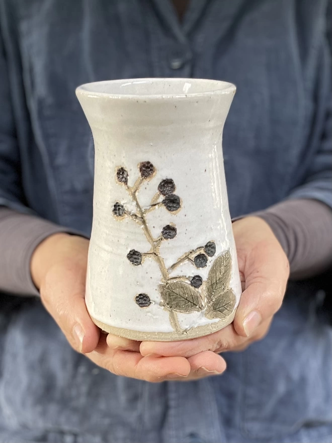 blackberry decorated pottery vase